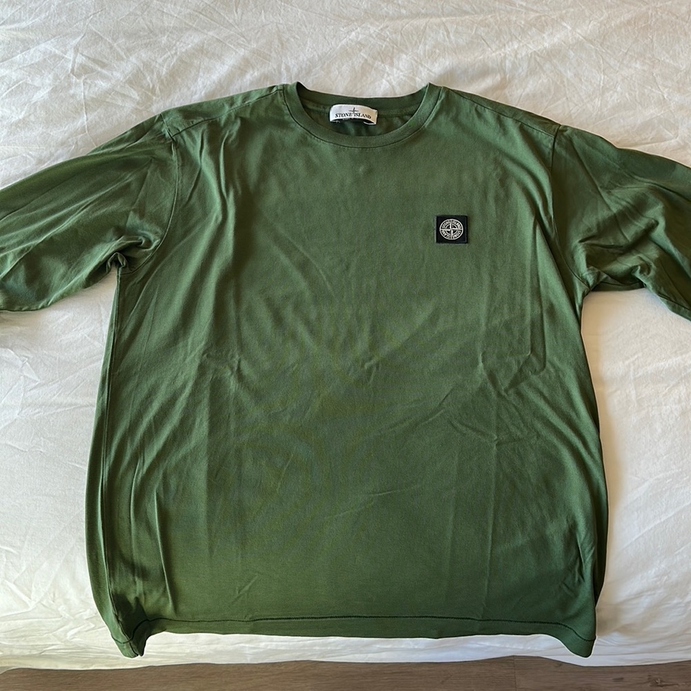 Brand new stone island long sleeve. Never been worn.